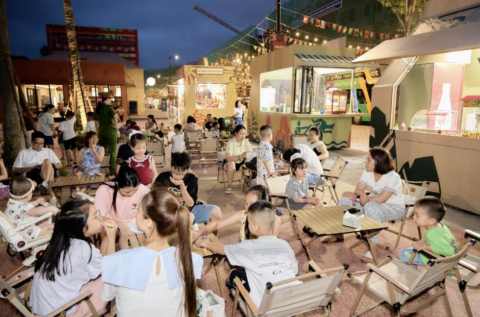 Eye-catching decorated stalls create a lively festival atmosphere at night