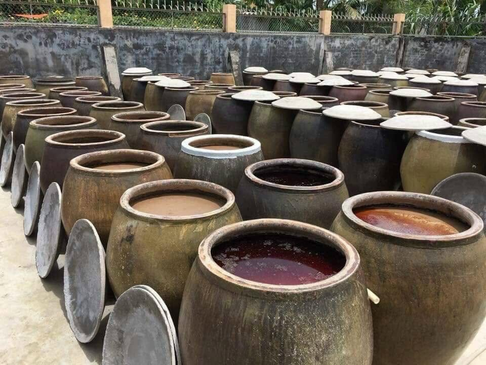 The traditional fish sauce-making craft contributes to Cat Hai's distinctive flavor
