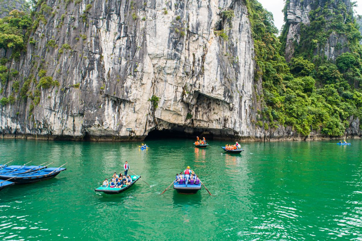 Lan Ha Bay impresses with limestone islands rising from clear emerald-green waters