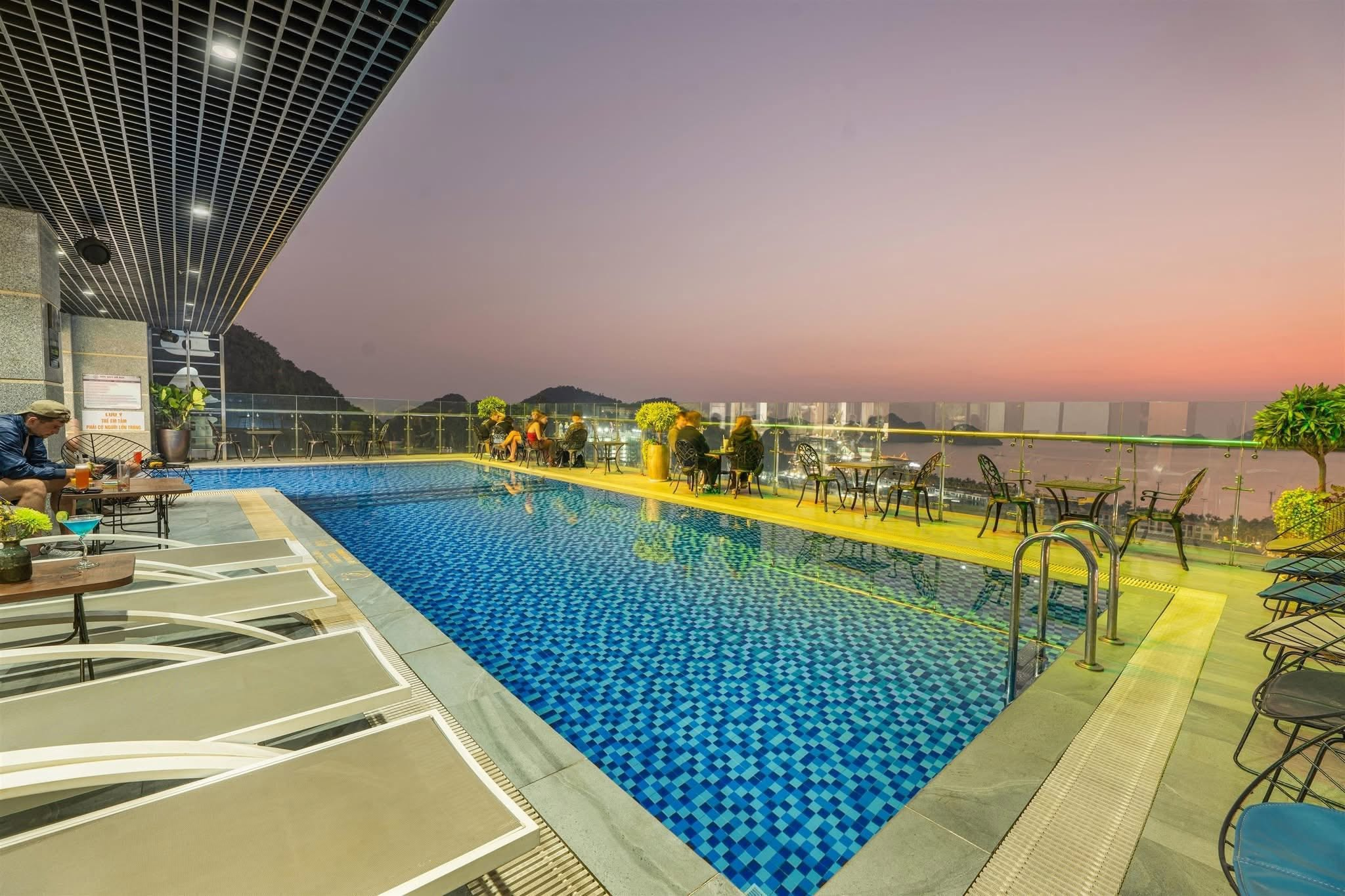 Paradise Skybar & Rooftop overlooking the sea at sunset