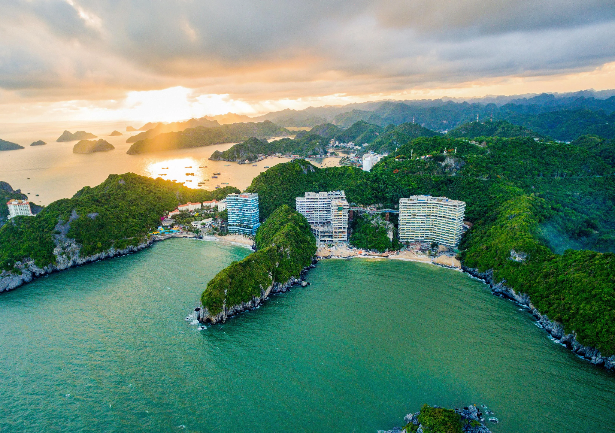 Early morning sunlight reflecting across the sea creates a romantic scene on Cat Ba