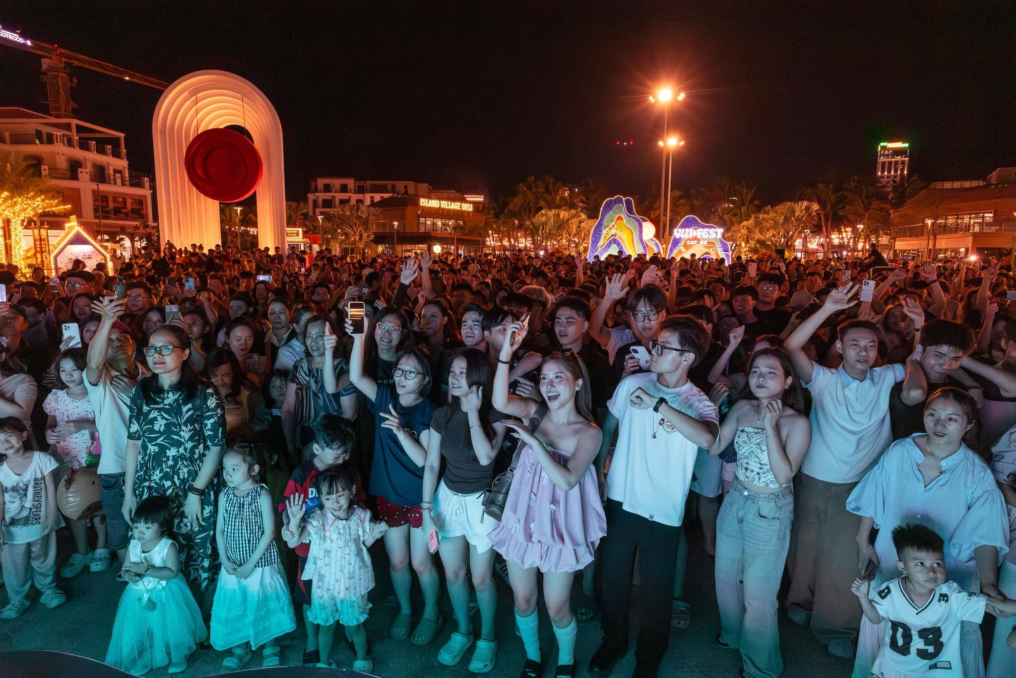 The lively atmosphere at VUI-Fest Cat Ba Night Market as the seaside town lights up at night