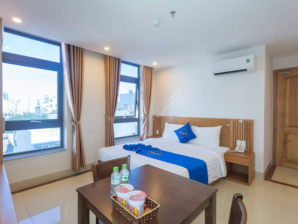 Phòng tại Hoàng Việt Motel được trang trí với gam màu nhã nhặn