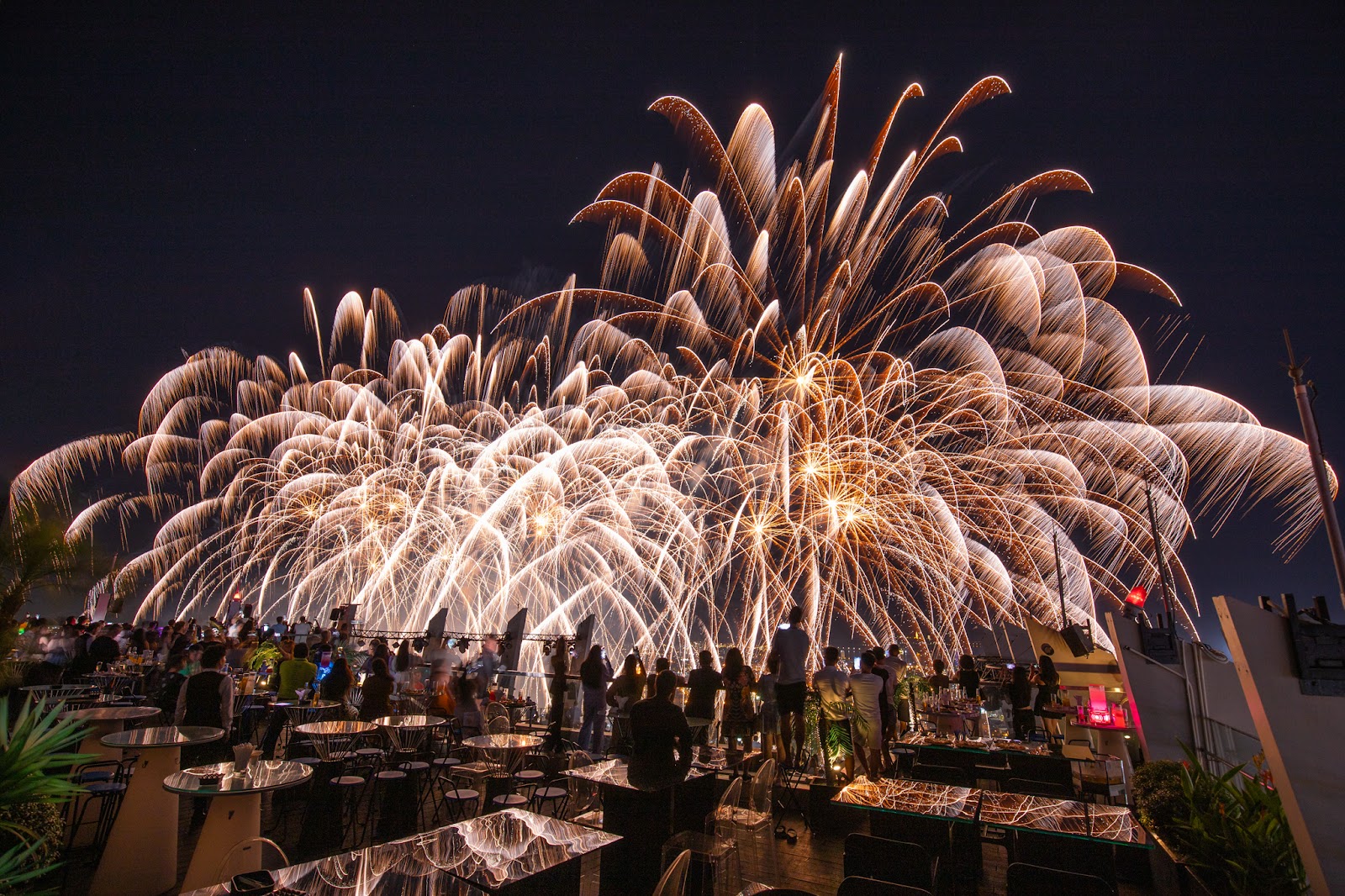 An exclusive eye-level view of the fireworks from a rooftop bar of Novotel Danang Premier Han River