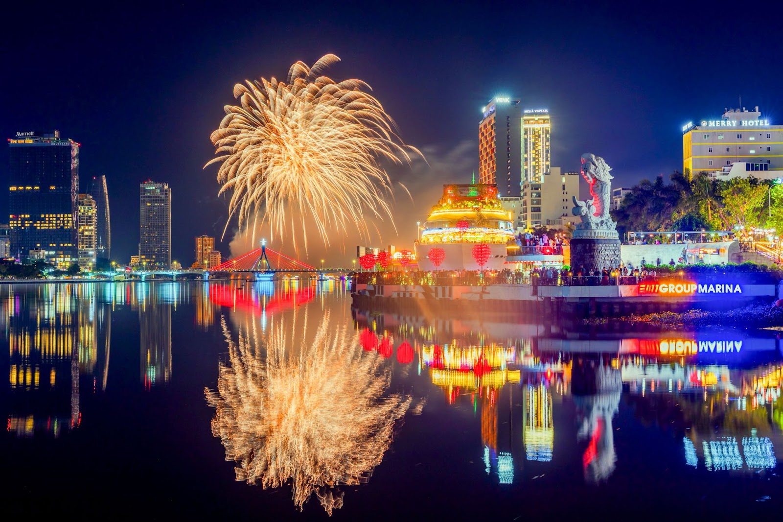 Golden fireworks reflecting beautifully on the Han River