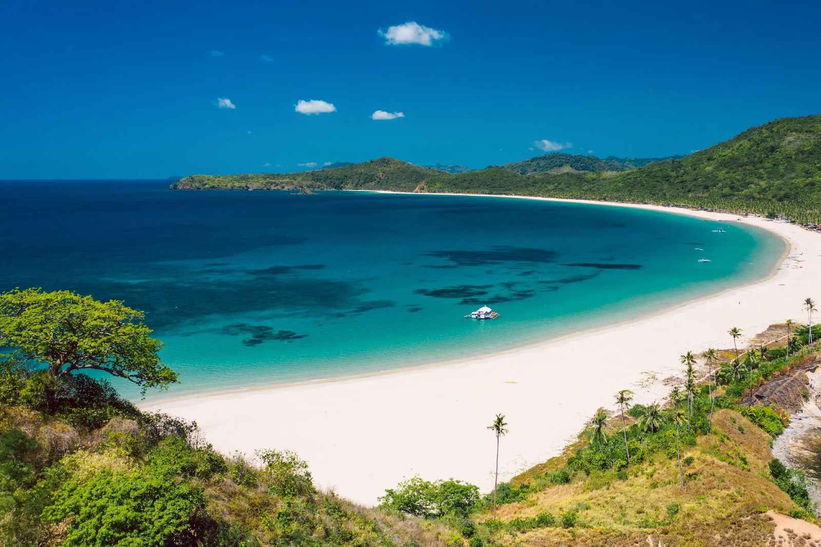 A long golden shoreline at Nacpan (Photo: Collected)