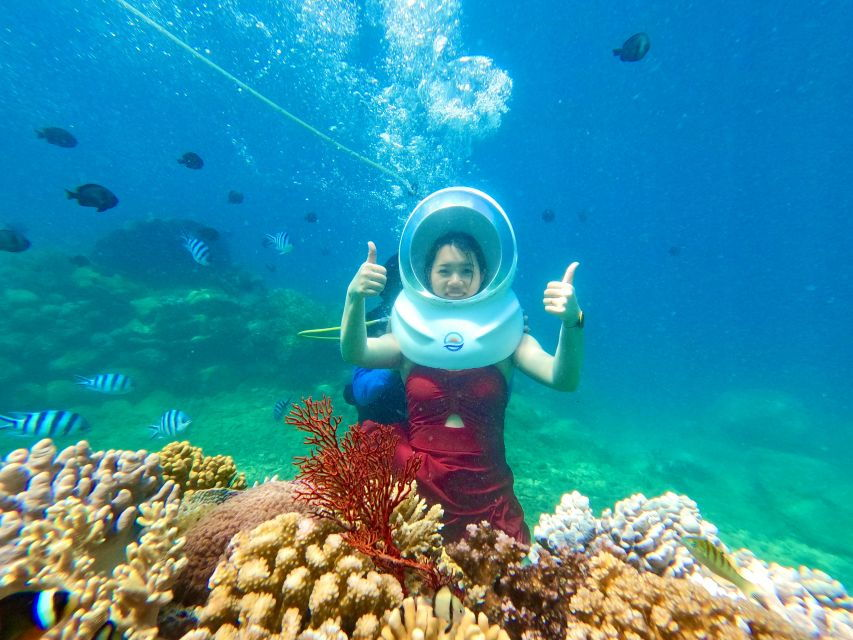 Visitors experience Sea Walking among coral reefs at Hon Thom Island. (Photo: collected)