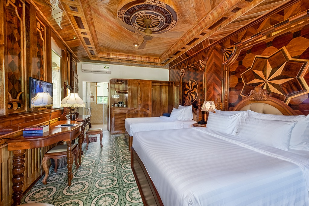 Phòng ngủ ấm cúng và tiện nghi tại Coco Palm Beach Resort Phu Quoc