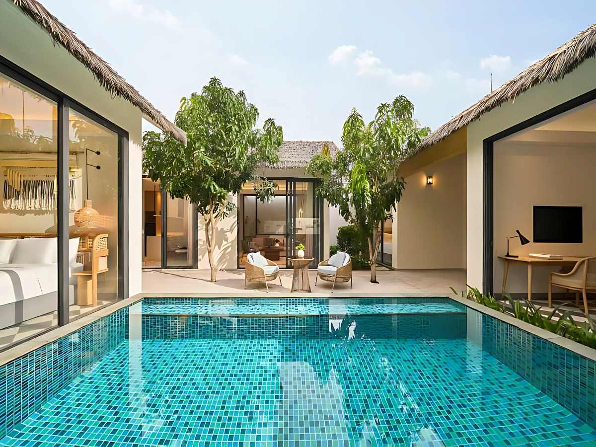 Garden Pool Villa Phu Quoc vườn riêng với hồ bơi ngoài trời.