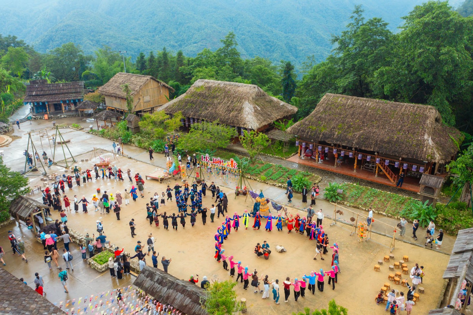 Experience vibrant traditional dances in the heart of May Village’s central courtyard
