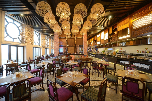 Enjoy a diverse buffet featuring over 50 regional specialties at Van Sam Restaurant