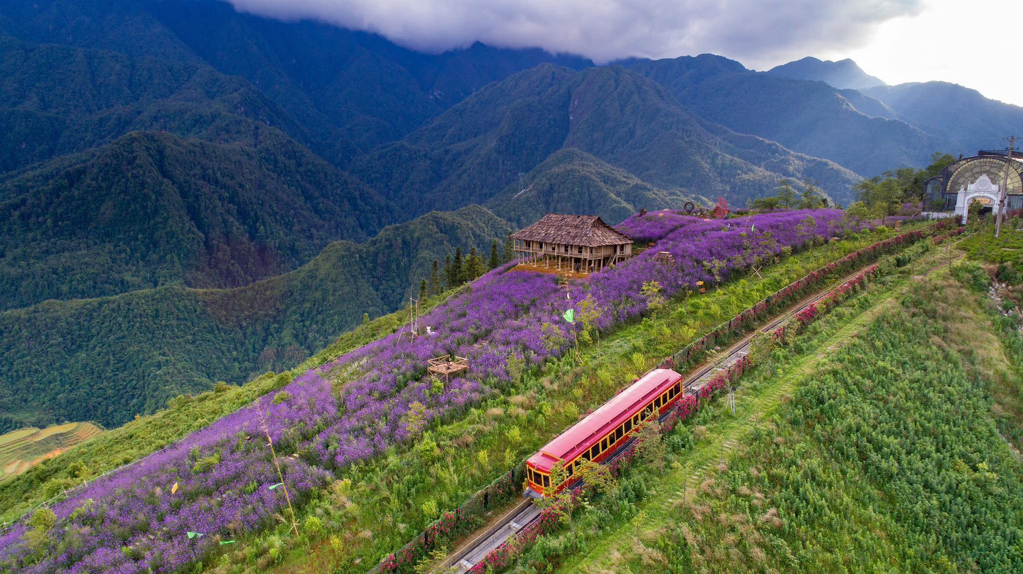 The Muong Hoa funicular features a unique design and vibrant red paint.