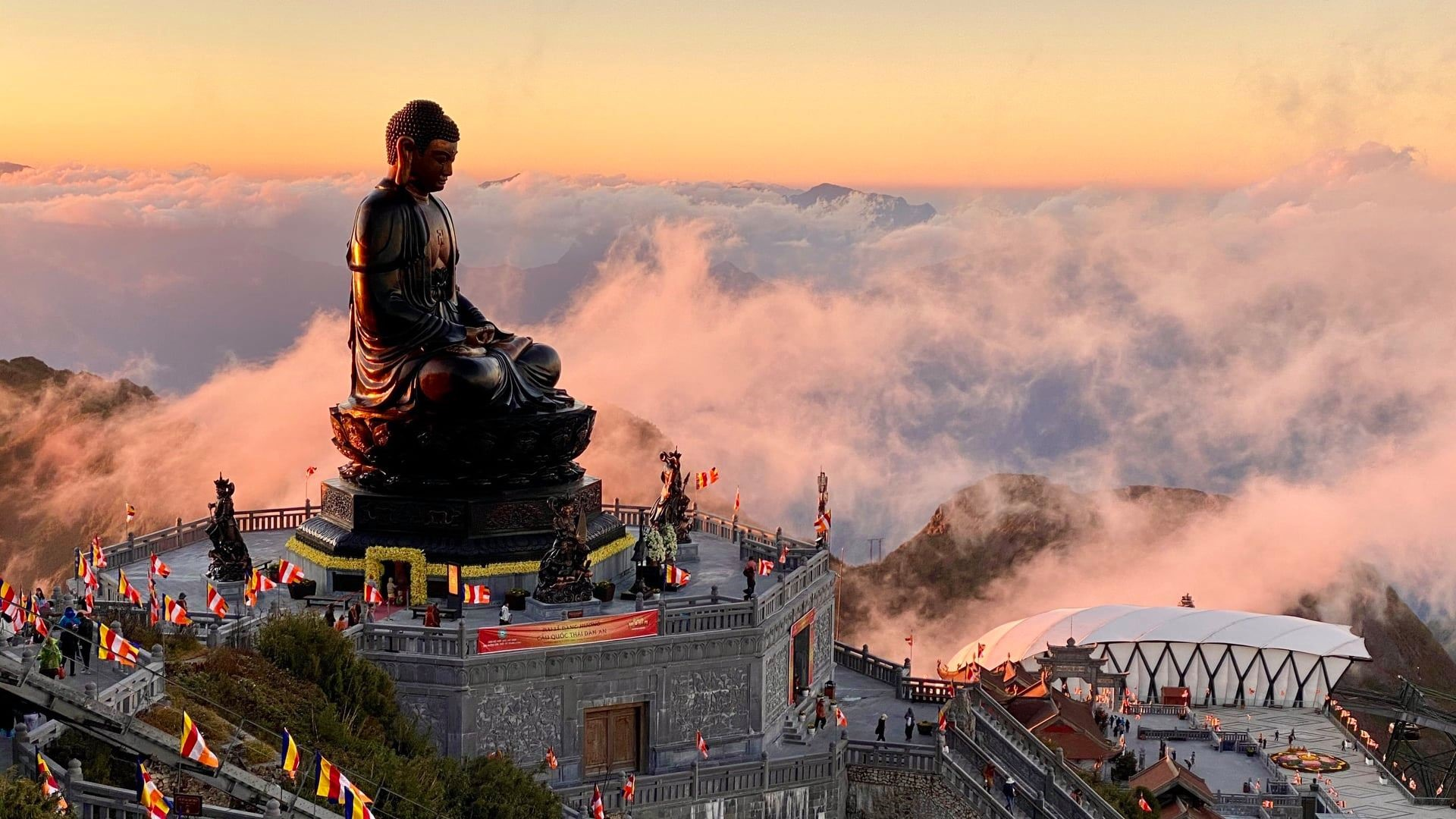 The giant bronze statue of Amitabha Buddha stands 21.5 meters tall.