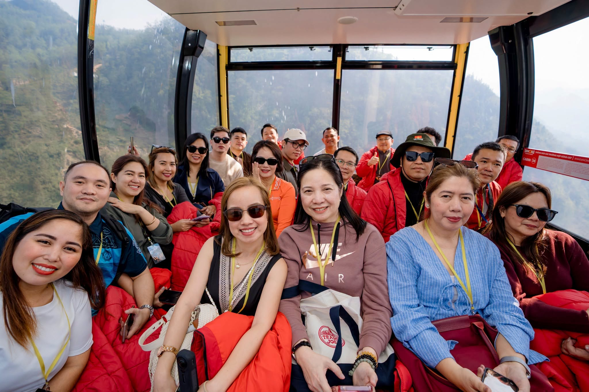 Tourists experience the Fansipan cable car