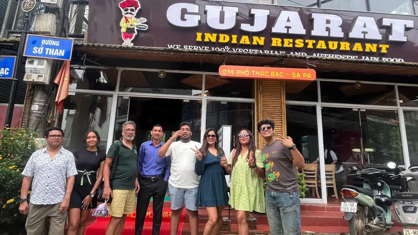 Indian tourists enjoying themselves at the GUJARAT restaurant.