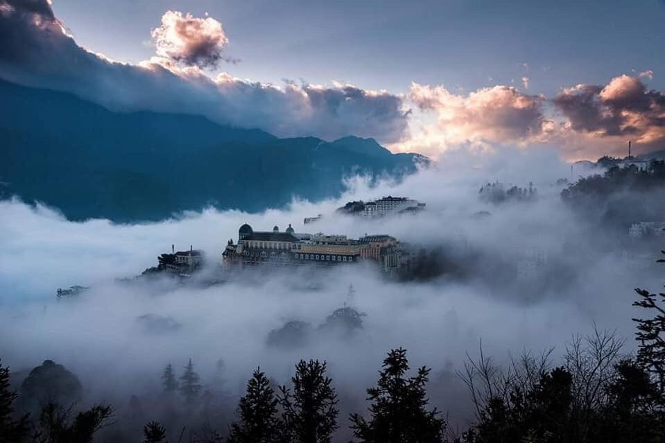 The sea of clouds surrounding the center of Sapa creates a magical scene