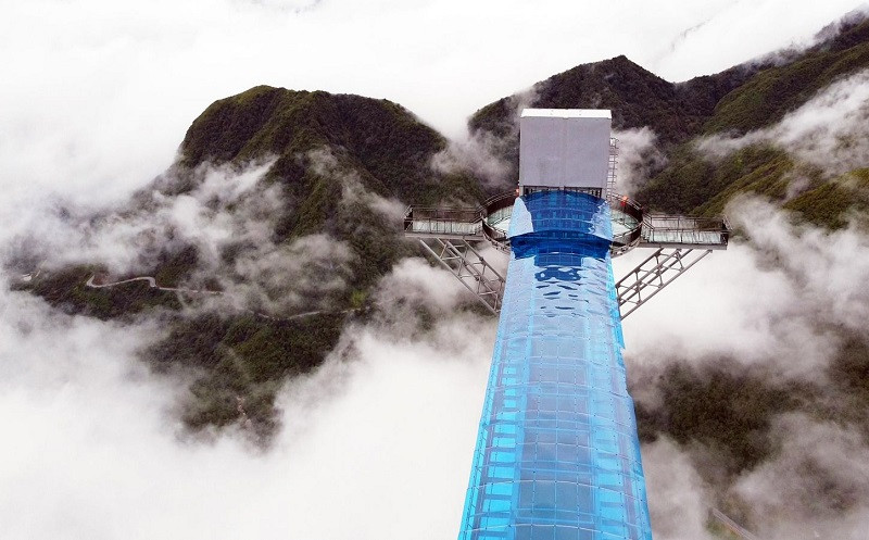 Tourists spend their first day exploring the glass bridge