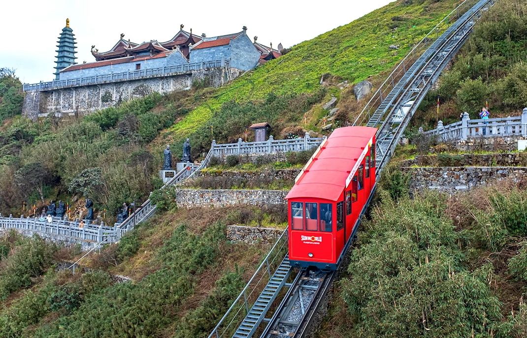 Modern cable car and train systems make it easier for tourists to conquer the mountain peak