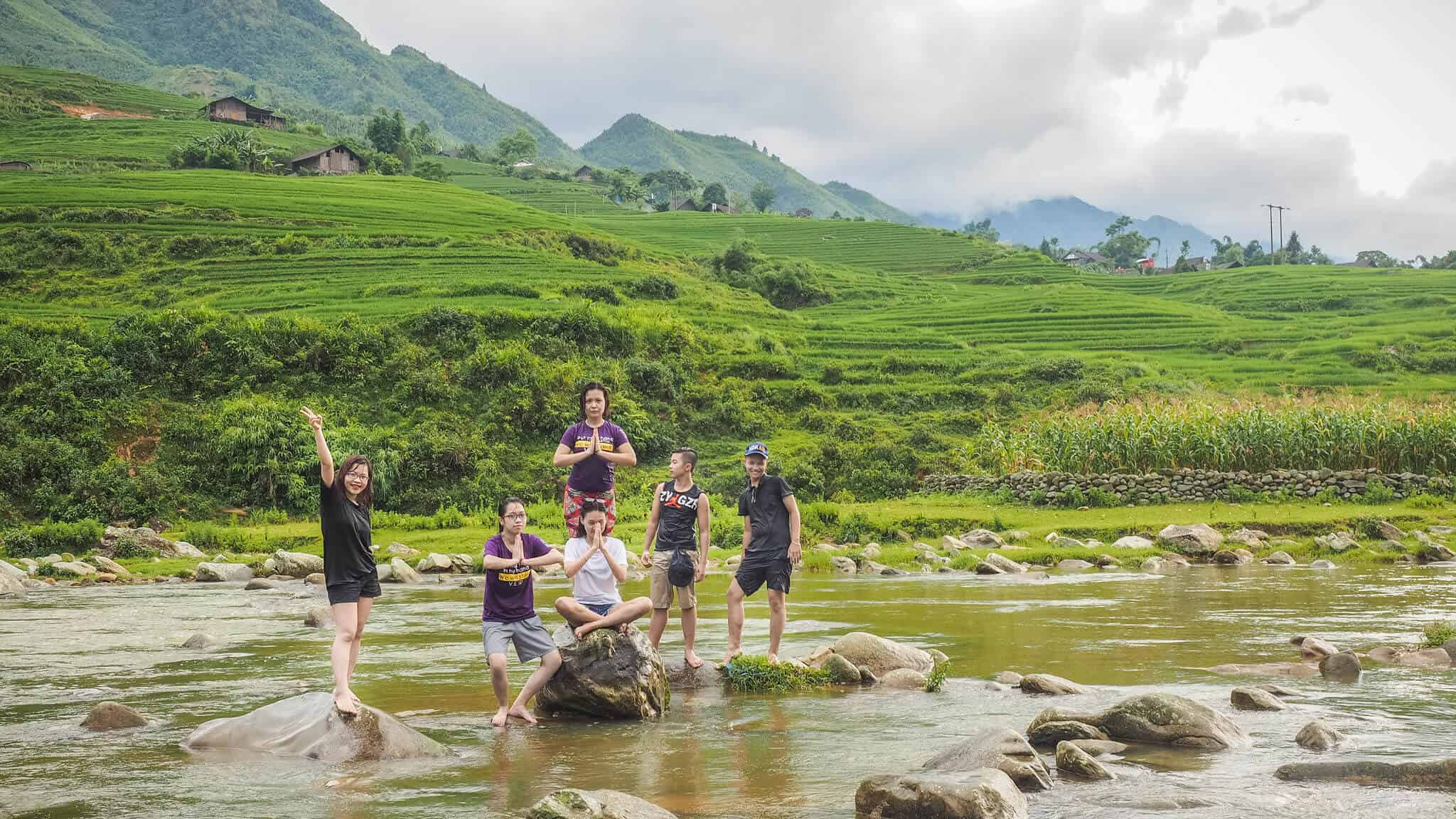 Tourists exploring Ta Van Village