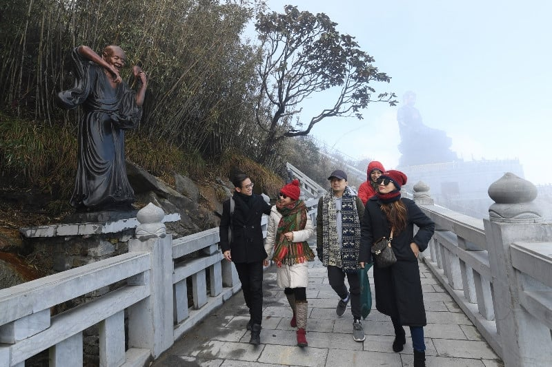 Visitors explore the Arhat Road