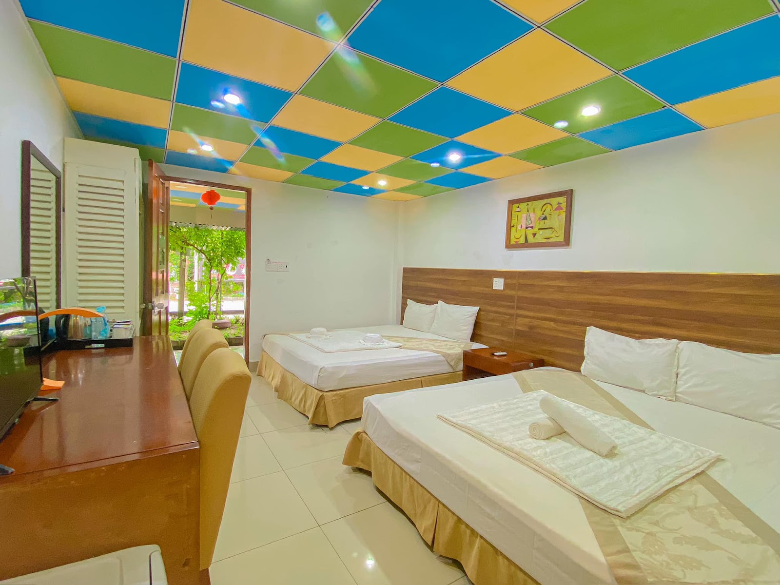 Phòng nghỉ thoáng mát, sạch sẽ tại khách sạn Vườn Cau