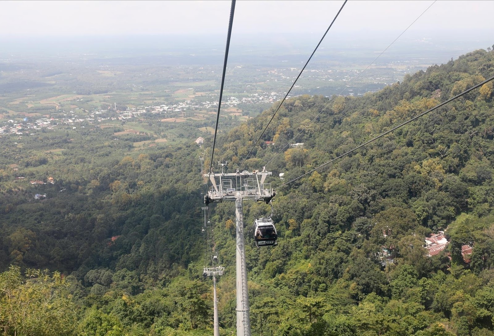Gliding above Chua Chan mountains on a scenic cable car ride