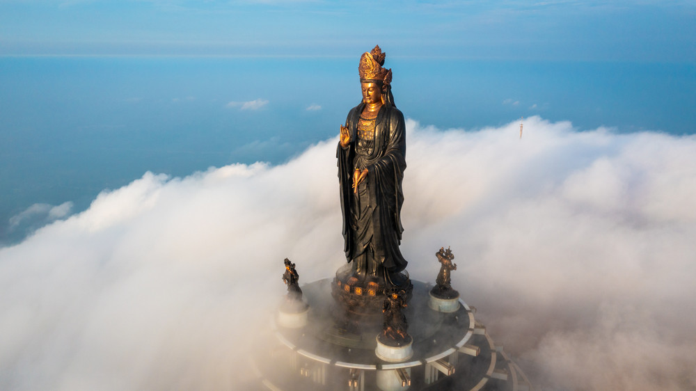 The sacred Statue of the Goddess of Mercy Tay Bo Da Son on the summit of Ba Den Mountain.