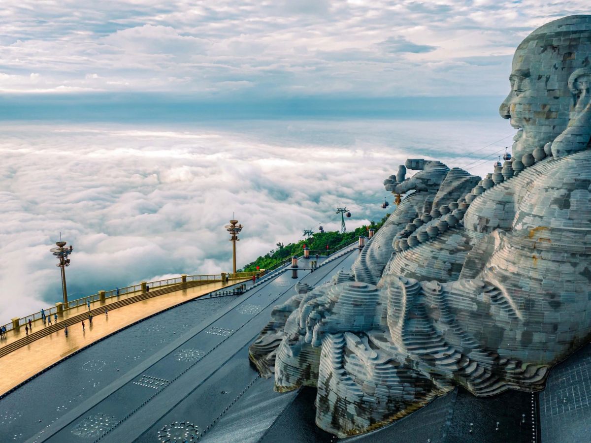 Viewing the sea of clouds from the summit of Ba Den Mountain.