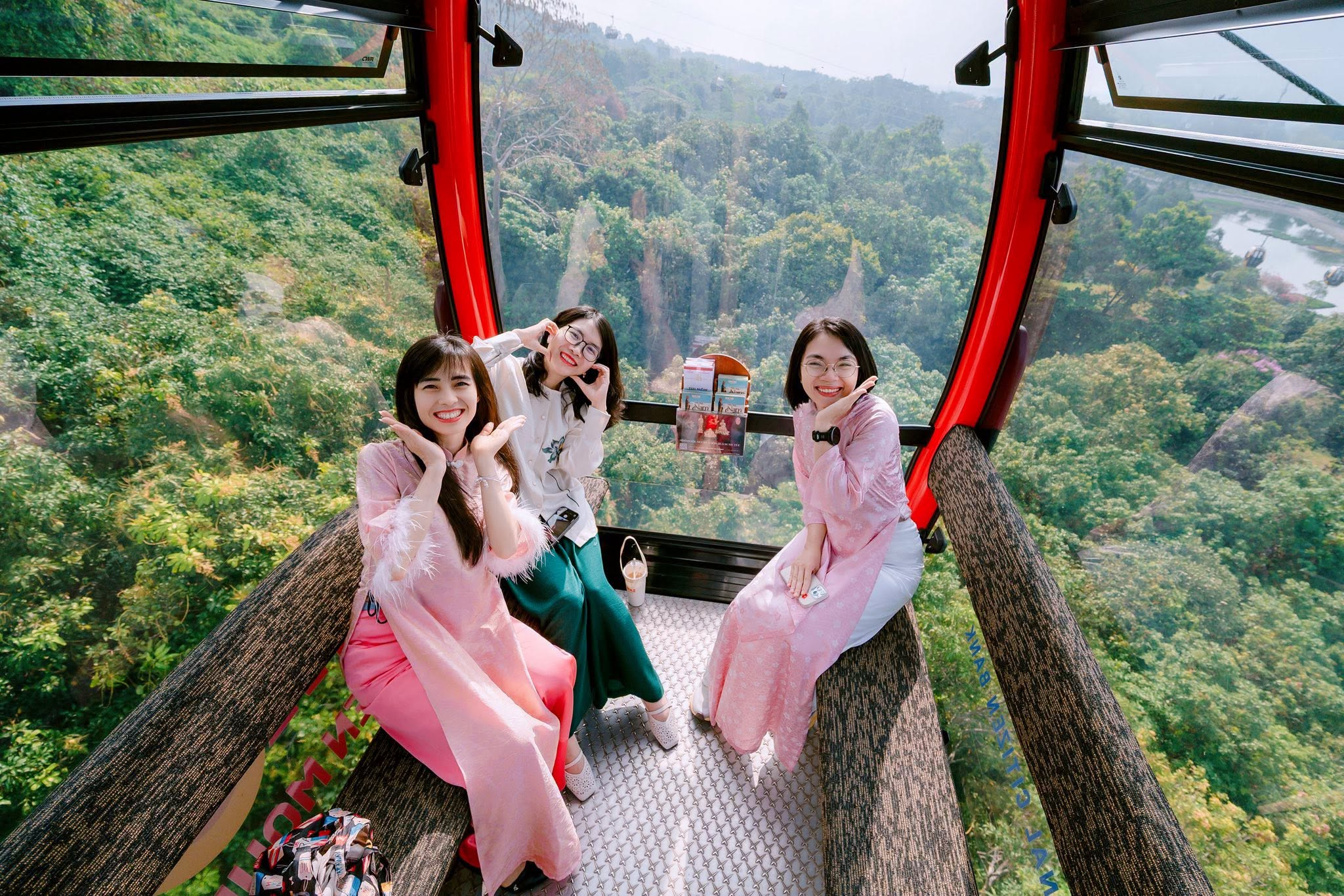 Tourists experience the Ba Den Mountain cable car